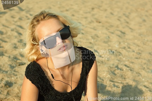 Image of Teenage girl on the sandy beach