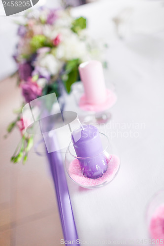 Image of Tables decorated with flowers and candles