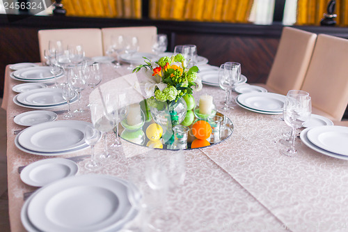 Image of tables decorated with flowers