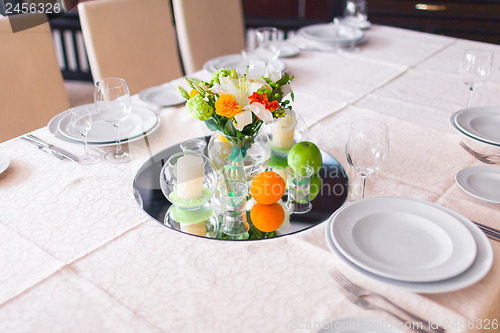 Image of tables decorated with flowers