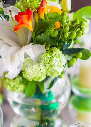Image of decoration with flowers and fruit