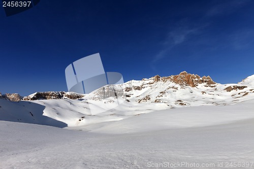 Image of Snow plateau and blue sky in sunny spring day