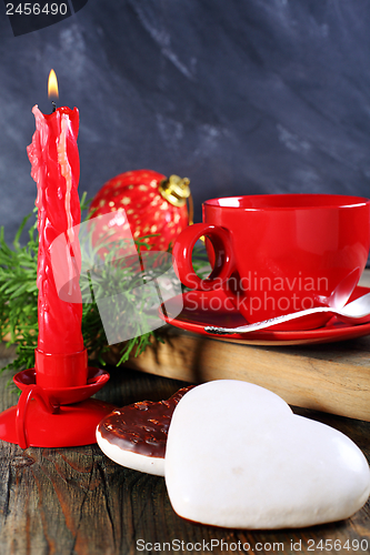 Image of Christmas cookies and candle.