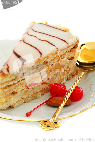 Image of Esterhazy cake and red cherry.