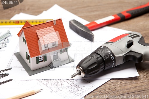 Image of Scale model of house with tools