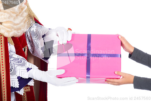 Image of Sinterklaas is giving a present