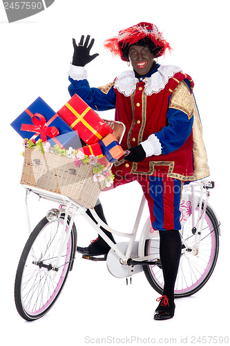 Image of Zwarte Piet on a bike with presents