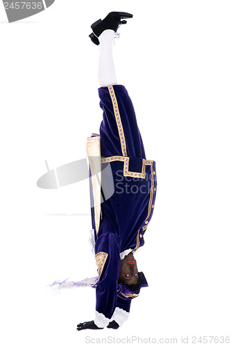 Image of Zwarte Piet is doing a handstand