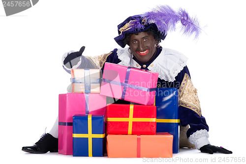 Image of Zwarte Piet with a lot of presents