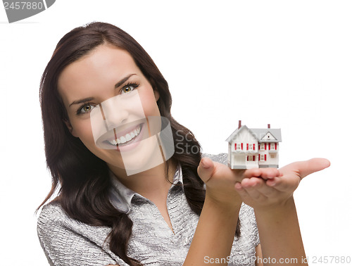 Image of Smiling Mixed Race Woman Holding Small House Isolated on White