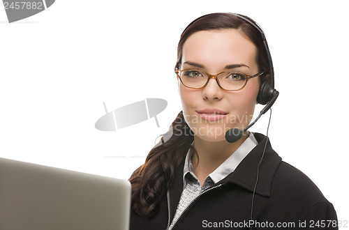 Image of Mixed Race Receptionist In Front of Computer Wearing Phone Head-