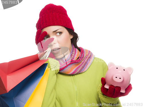 Image of Concerned Expressive Mixed Race Woman Holding Shopping Bags and 