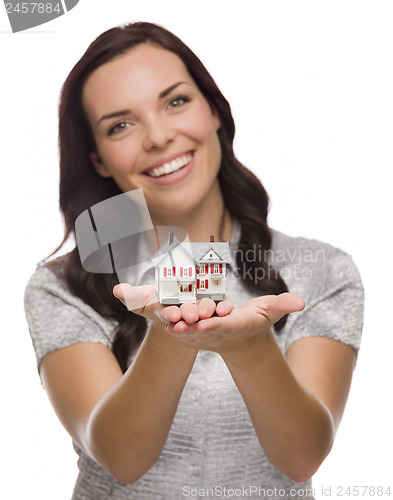 Image of Pretty Mixed Race Woman Holding Small House Isolated on White