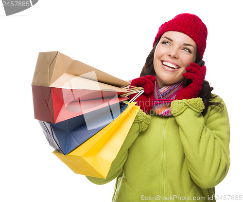 Image of Mixed Race Woman Holding Shopping Bags On Cell Phone Looking Up