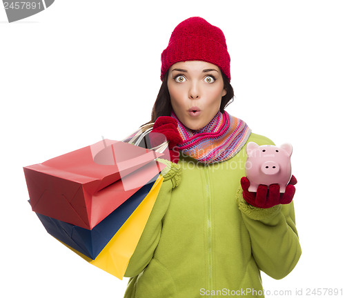 Image of Concerned Expressive Mixed Race Woman Holding Shopping Bags and 