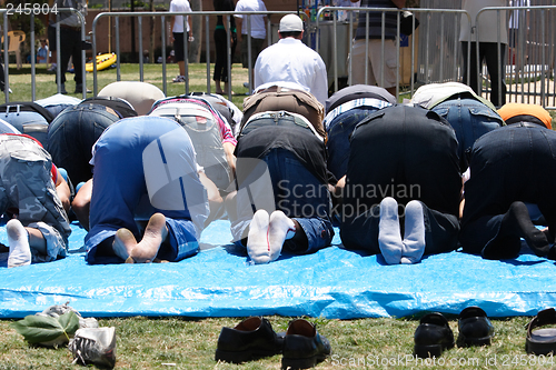 Image of An Imam leading the prayer group