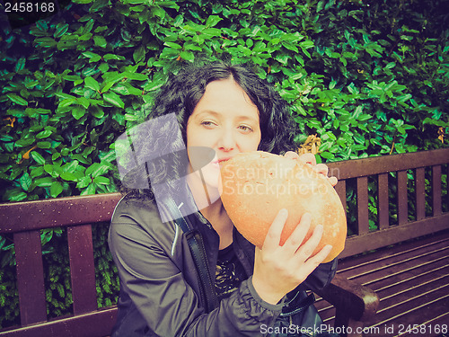 Image of Girl eating bread