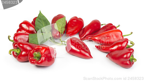 Image of Red peppers and leaves