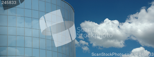 Image of Corporate building and clouds