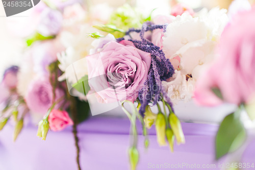 Image of Tables decorated with flowers. Closeup details