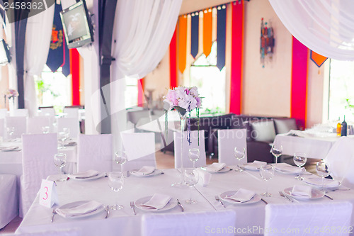 Image of Tables decorated with flowers