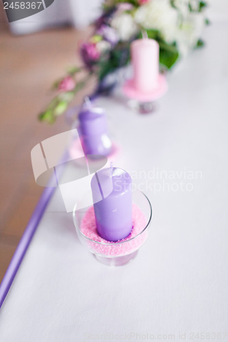 Image of Tables decorated with flowers and candles