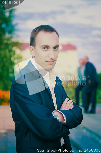 Image of Businessman Wearing Suit And Looking To The Camera