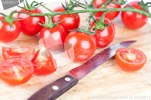Image of fresh tomatoes old knife 