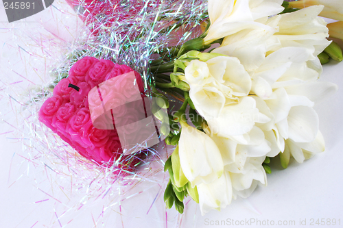 Image of Flowers and candle