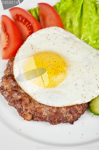 Image of steak beef meat with fried egg