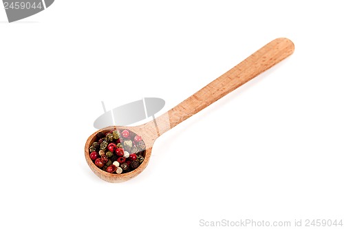 Image of mixture of peppers in wooden spoon