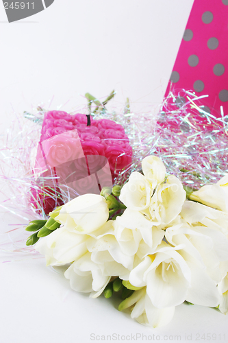 Image of Flowers and candle