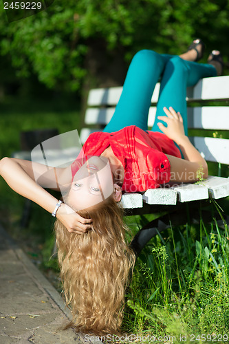 Image of Young curly blond woman