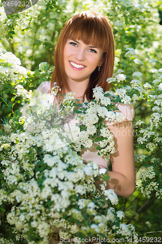 Image of Pretty red-haired woman