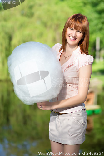 Image of Smiling red-haired woman