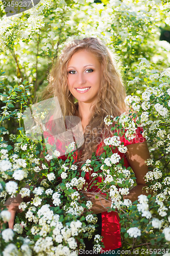 Image of Curly young blond woman