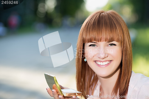 Image of Young smiling woman