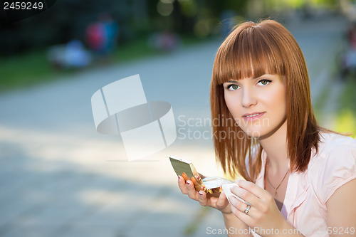 Image of Pretty red-haired woman