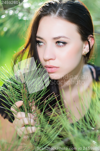 Image of Young thoughtful brunette