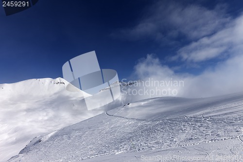 Image of Off-piste slope with traces of skis