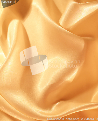 Image of Smooth elegant golden silk as background