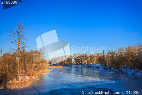 Image of Cracked Ice On River In Spring