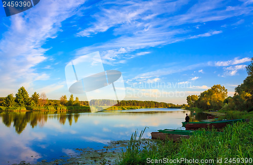 Image of Clouds Reflection On Lake River