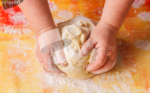 Image of Dough And Hands Close Up 