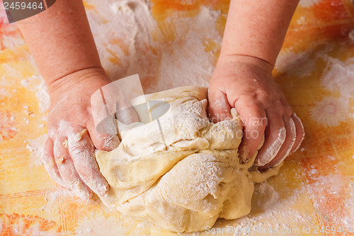 Image of Dough And Hands Close Up 