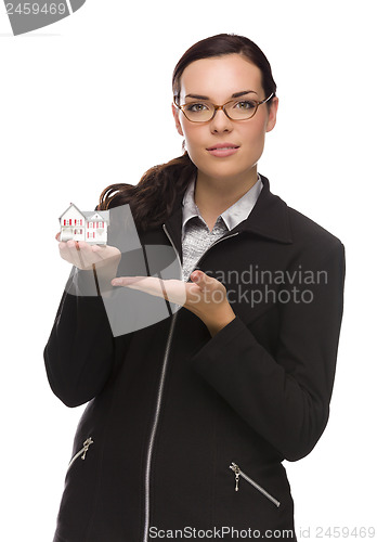 Image of Mixed Race Businesswoman Holding Small House to the Side
