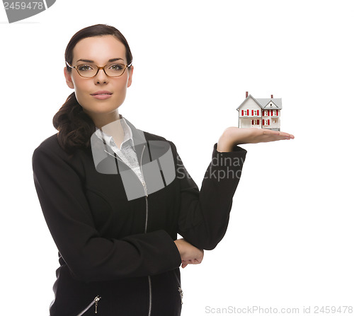 Image of Mixed Race Businesswoman Holding Small House to the Side
