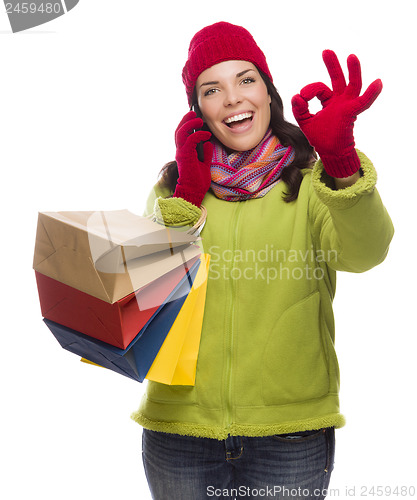 Image of Mixed Race Woman Holding Shopping Bags On Phone Ok Gesture
