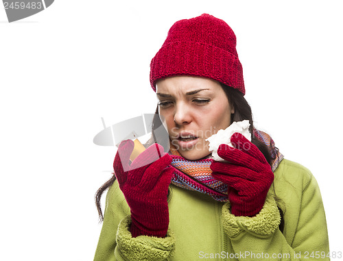 Image of Sick Mixed Race Woman with Empty Medicine Bottles Blowing Nose 
