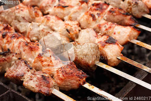 Image of Juicy Slices Of Meat With Sauce Prepare On Fire (Shish Kebab, Sh